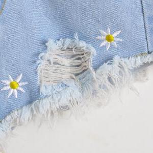 Daisy Embroidered Light Denim Distressed Shorts..