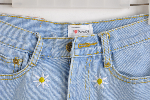 Daisy Embroidered Light Denim Distressed Shorts With Frayed Hem on Luulla
